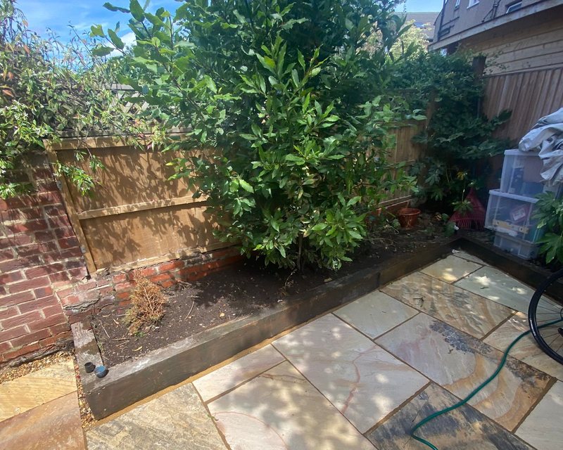 Block paved patio with natural stone by White&Son